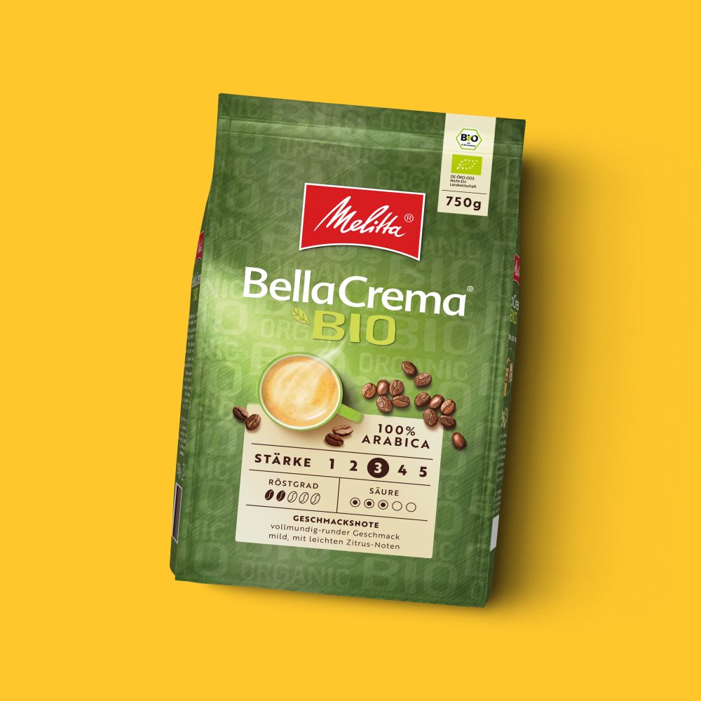 Abbildung einer Packung Melitta BellaCrema Bio auf gelbem Hintergrund