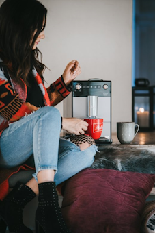  Image of a woman having a coffee