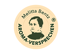 Ein Siegel mit dem Abbild von Melitta Bentz und dem Schriftzug „Aroma-Versprechen“ ist zu sehen.